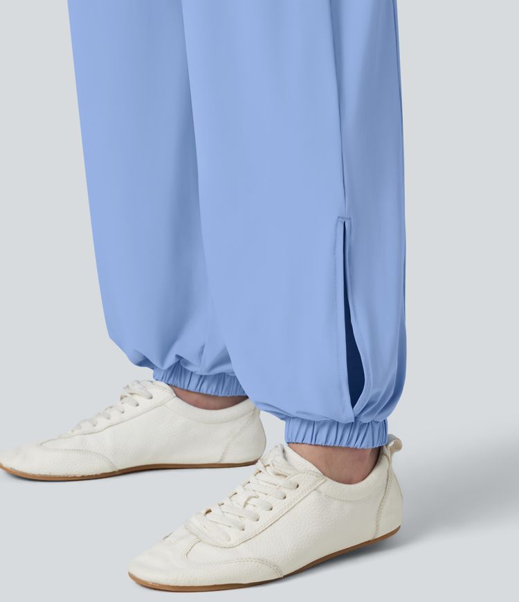 Workout-Joggers mit hohem Bund, Seitentaschen, Kordelzug, Cool-Touch und Schlitz - schnelltrocknend, UPF50+