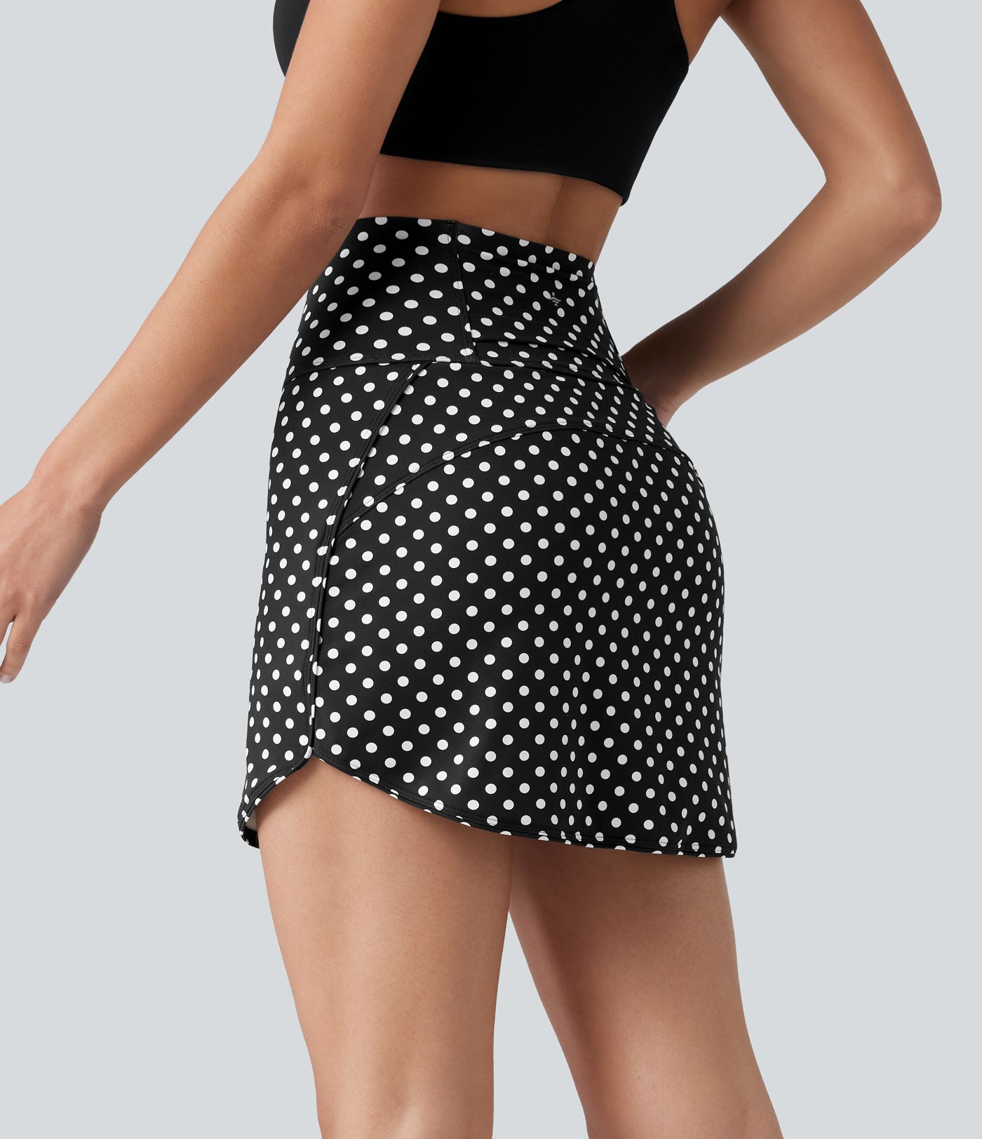 Mini-jupe de golf 2 en 1 à pois, taille ultra haute, effet ventre plat, ourlet arrondi et poches