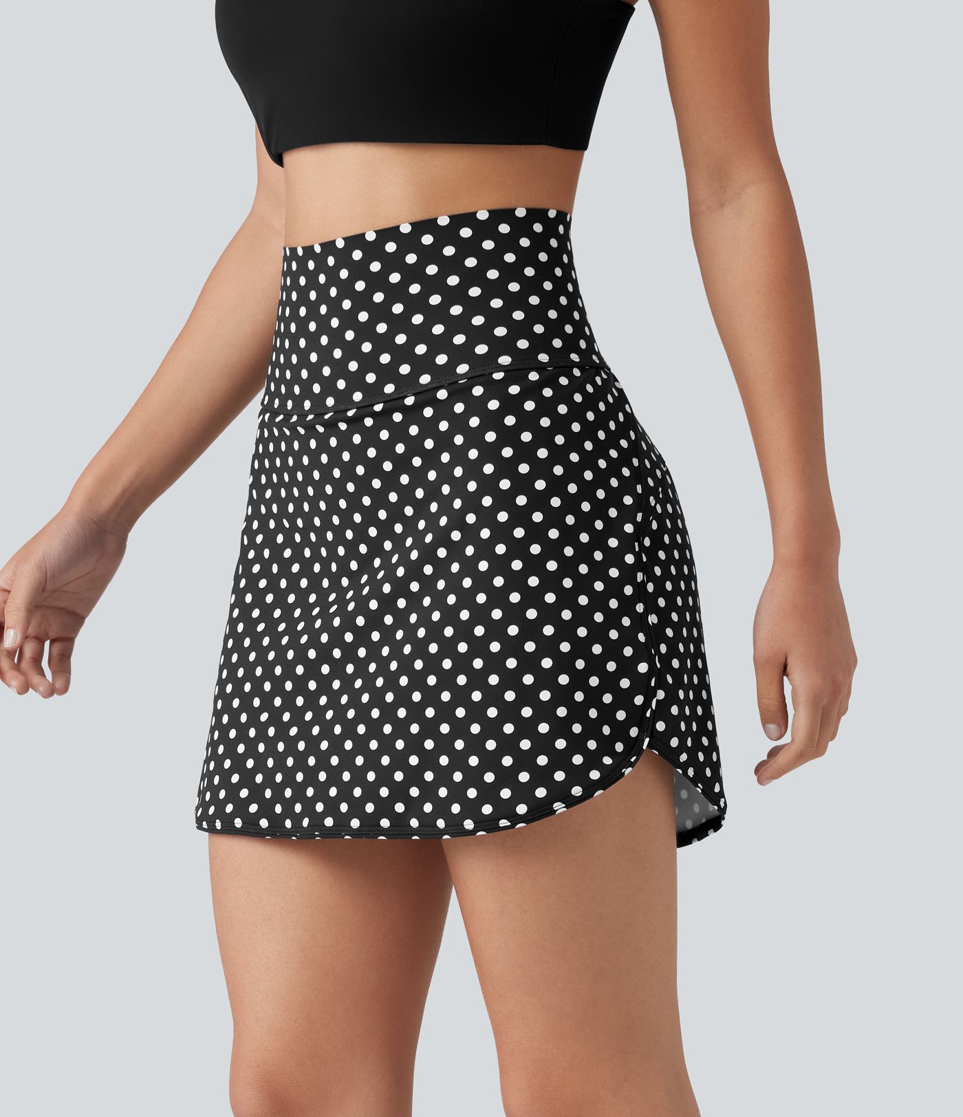 Mini-jupe de golf 2 en 1 à pois, taille ultra haute, effet ventre plat, ourlet arrondi et poches