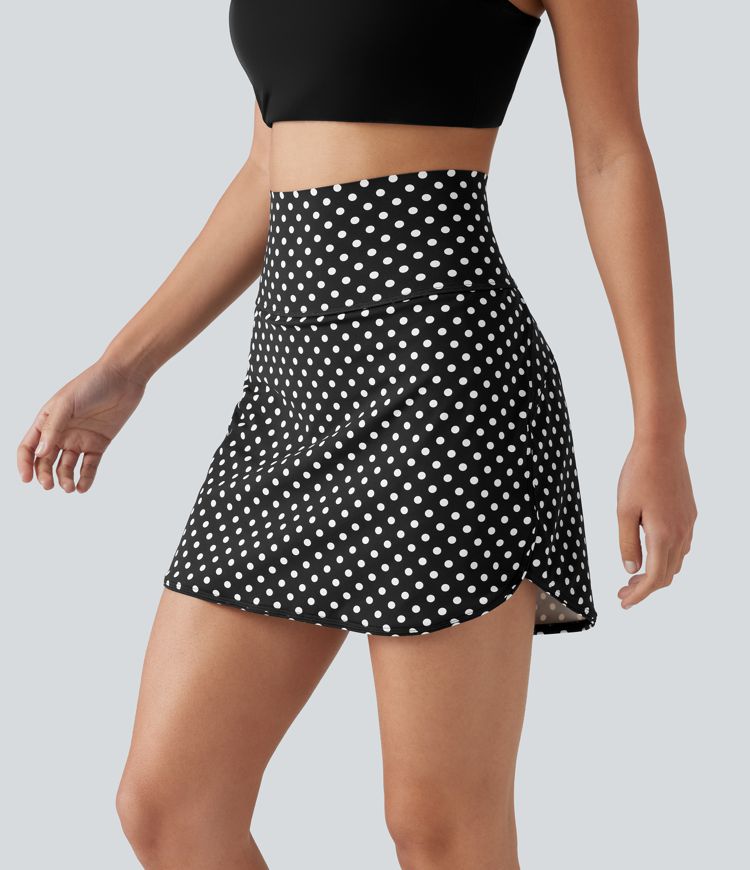 Mini-jupe de golf 2 en 1 à pois, taille ultra haute, effet ventre plat, ourlet arrondi et poches