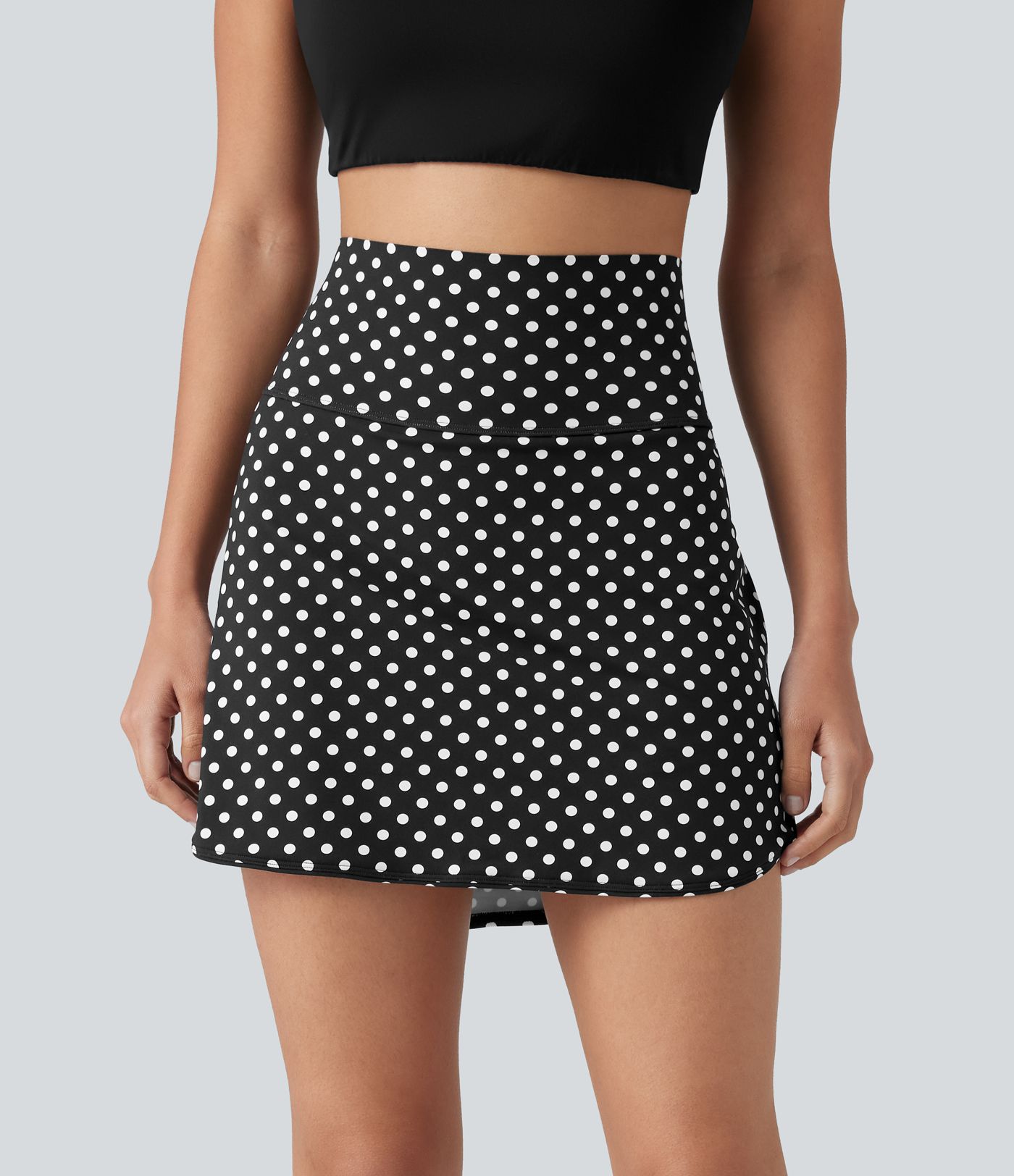 Mini-jupe de golf 2 en 1 à pois, taille ultra haute, effet ventre plat, ourlet arrondi et poches