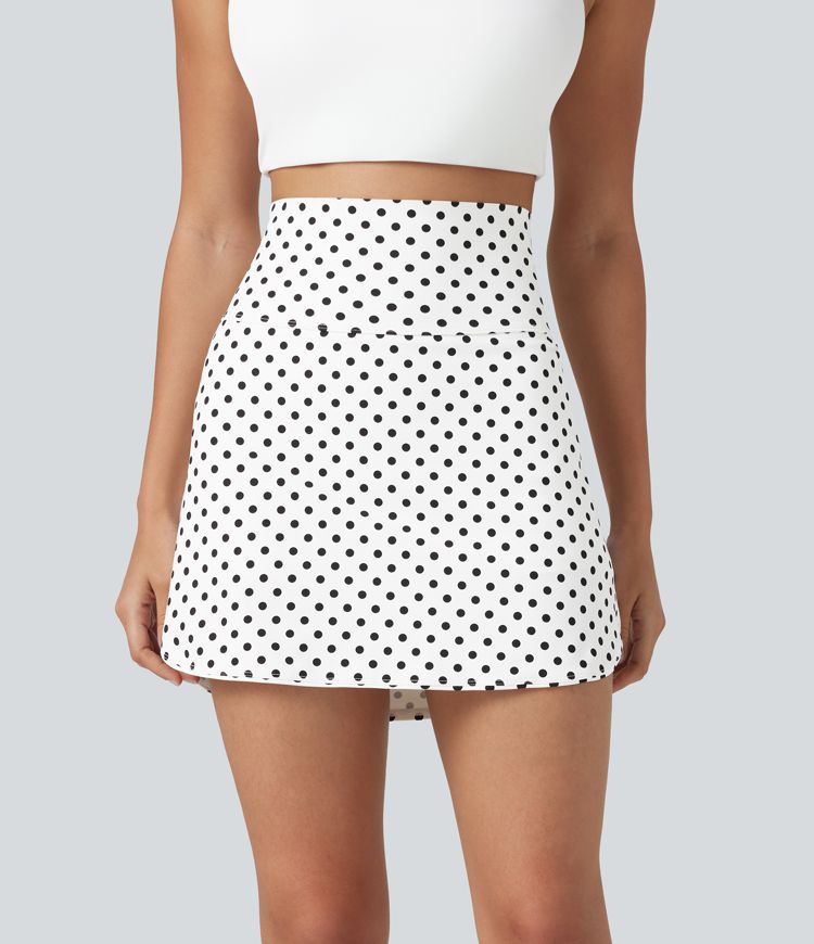 Mini-jupe de golf 2 en 1 à pois, taille ultra haute, effet ventre plat, ourlet arrondi et poches