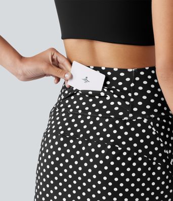 Mini-jupe de golf 2 en 1 à pois, taille ultra haute, effet ventre plat, ourlet arrondi et poches