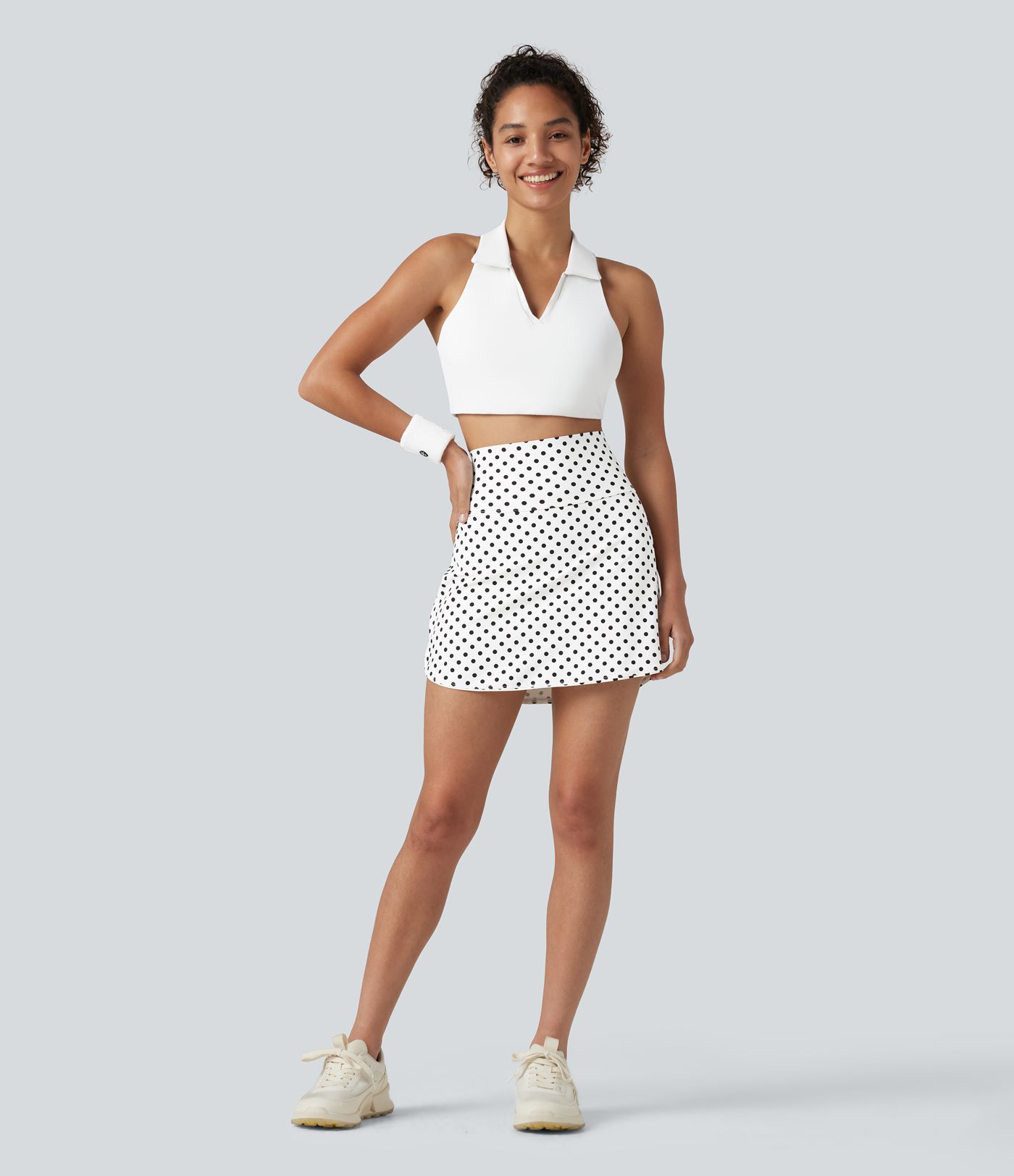 Mini-jupe de golf 2 en 1 à pois, taille ultra haute, effet ventre plat, ourlet arrondi et poches