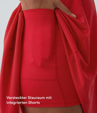 Fließendes 2-in-1 Mini-Tanzkleid mit Seitentaschen, High-Low-Design, kontrastierendem Mesh und Schnürung - A-D-Cups Fließendes 2-in-1 Mini-Tanzkleid mit Seitentaschen, High-Low-Design, kontrastierendem Mesh und Schnürung - A-D-Cups