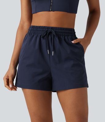 Baggy-Workout-Shorts aus elastischem Popeline mit hohem Bund, mehreren Taschen und Kordelzug