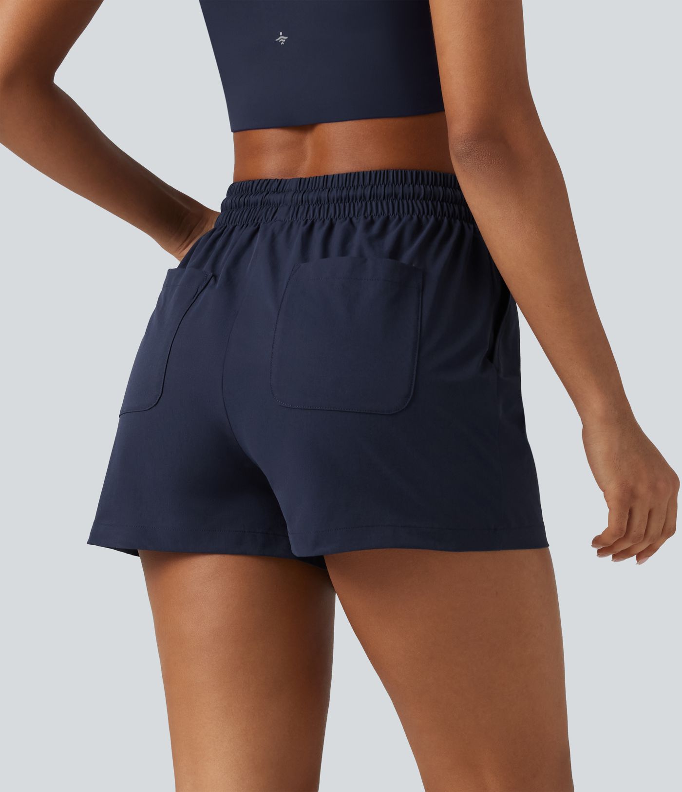 Baggy-Workout-Shorts aus elastischem Popeline mit hohem Bund, mehreren Taschen und Kordelzug