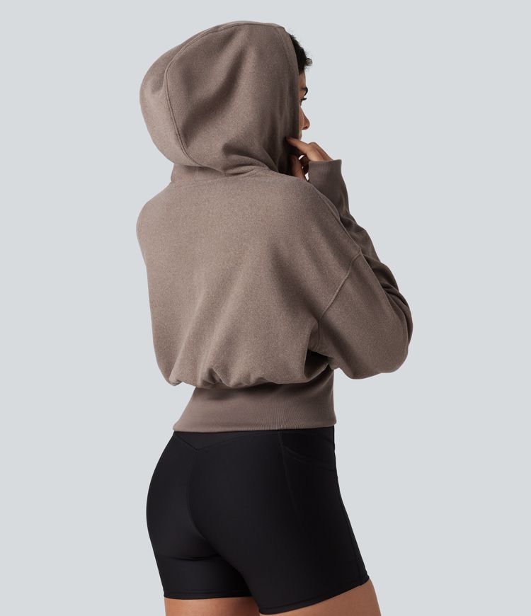Lässiger Pullover mit Kapuze, langen Raglanärmeln und Daumenlöchern Lässiger Pullover mit Kapuze, langen Raglanärmeln und Daumenlöchern