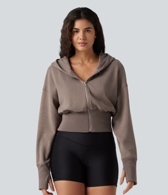 Lässiger Pullover mit Kapuze, langen Raglanärmeln und Daumenlöchern Lässiger Pullover mit Kapuze, langen Raglanärmeln und Daumenlöchern