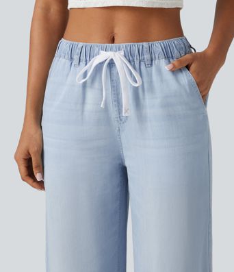 Jeans casual de tiro medio con cordón y bolsillos