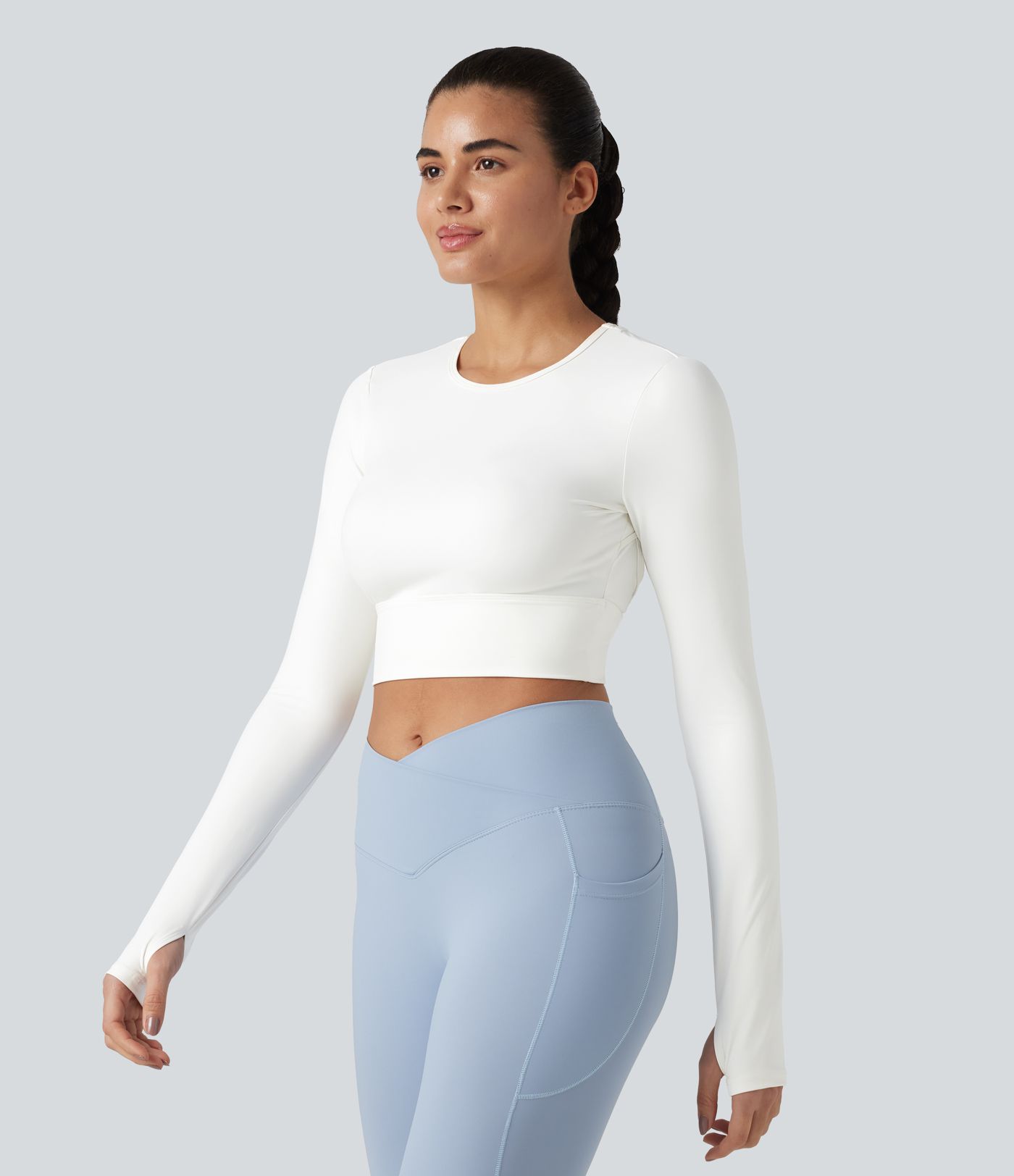 Haut de sport dos nu à manches longues avec passe-pouces, toucher frais, séchage rapide, protection UPF50+ pour le yoga