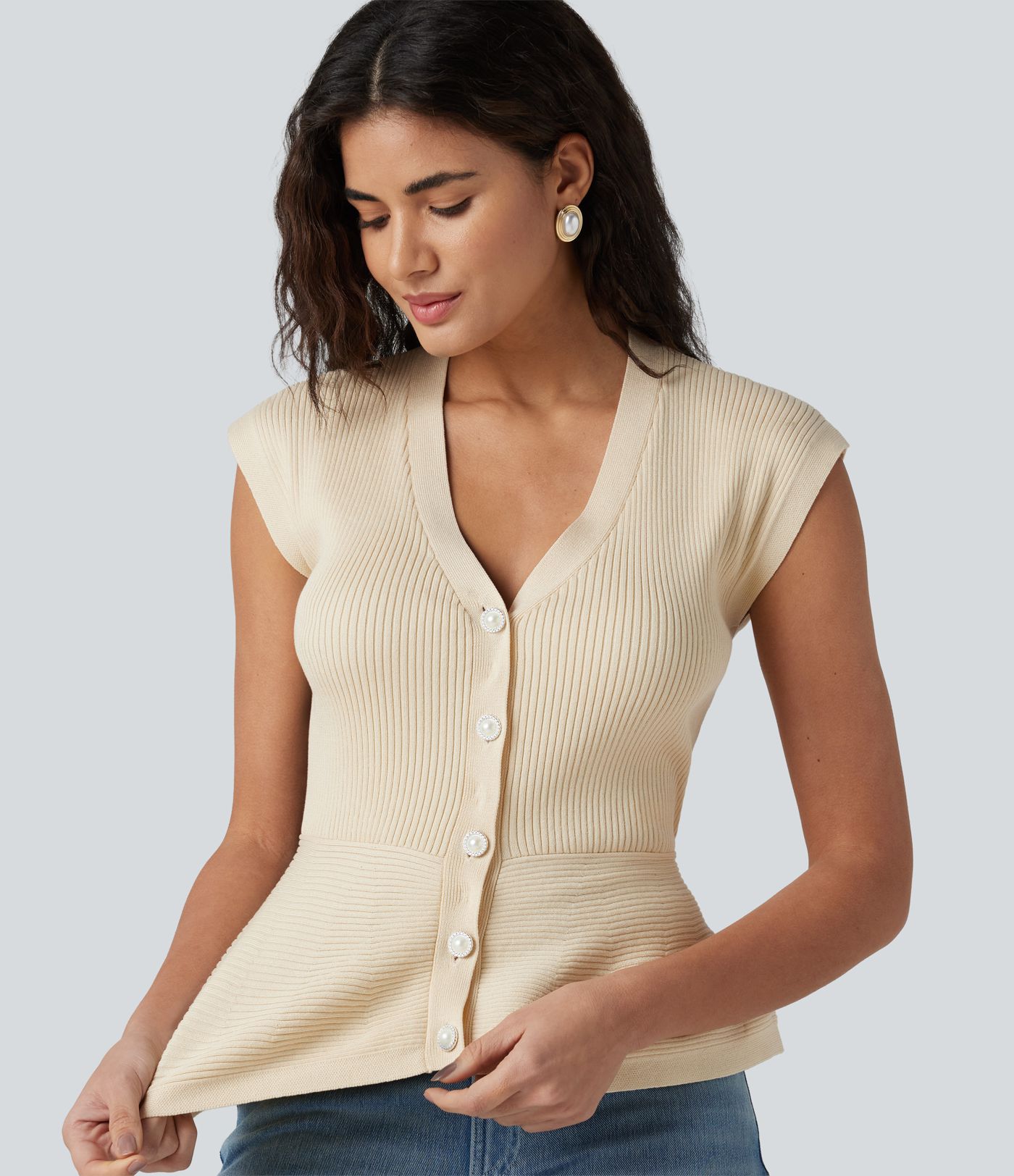 Ärmelloser Cardigan mit V-Ausschnitt und Schößchen