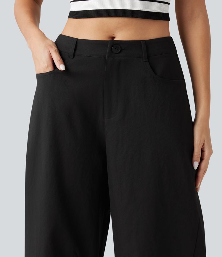 Lässige, locker geschnittene Hose mit mittelhohem Bund, mehreren Taschen und Barrel-Leg Lässige, locker geschnittene Hose mit mittelhohem Bund, mehreren Taschen und Barrel-Leg