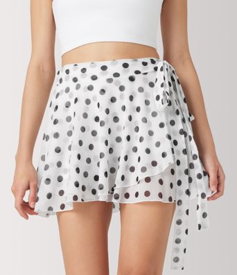 Jupe évasée micro‑mini en résille à pois, taille haute, 2 en 1, à nouer sur le côté, fluide, avec poche