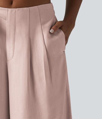 Pantalon large fluide taille haute en lin mélangé avec poches et liens latéraux Pantalon large fluide taille haute en lin mélangé avec poches et liens latéraux