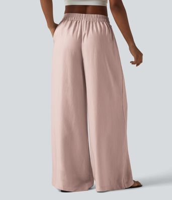 Pantalon large fluide taille haute en lin mélangé avec poches et liens latéraux Pantalon large fluide taille haute en lin mélangé avec poches et liens latéraux