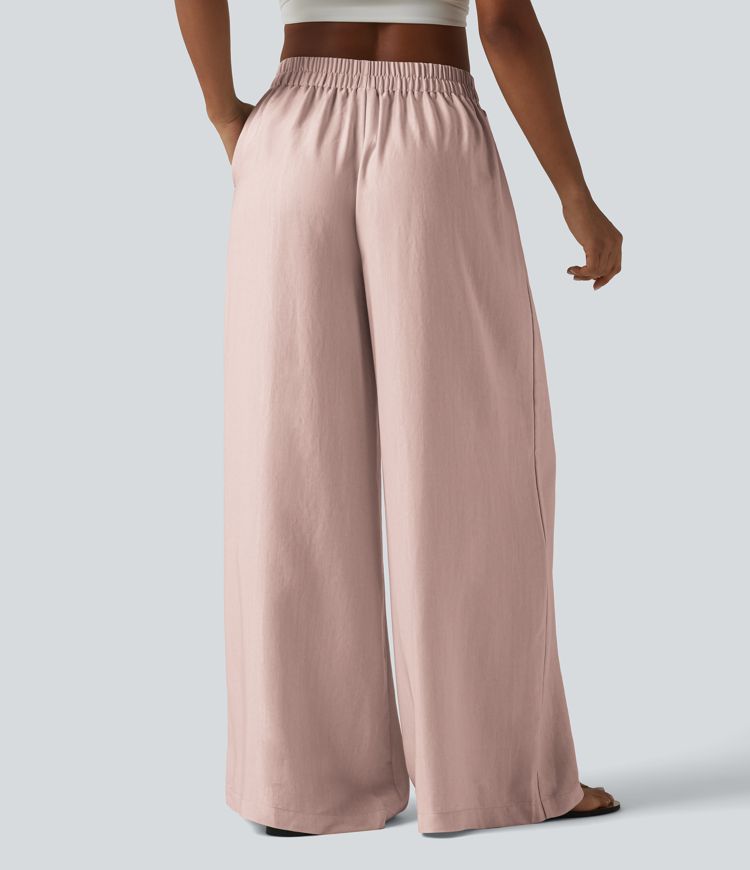Pantalon large fluide taille haute en lin mélangé avec poches et liens latéraux Pantalon large fluide taille haute en lin mélangé avec poches et liens latéraux