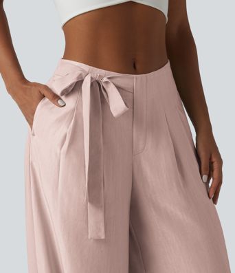 Pantalon large fluide taille haute en lin mélangé avec poches et liens latéraux Pantalon large fluide taille haute en lin mélangé avec poches et liens latéraux