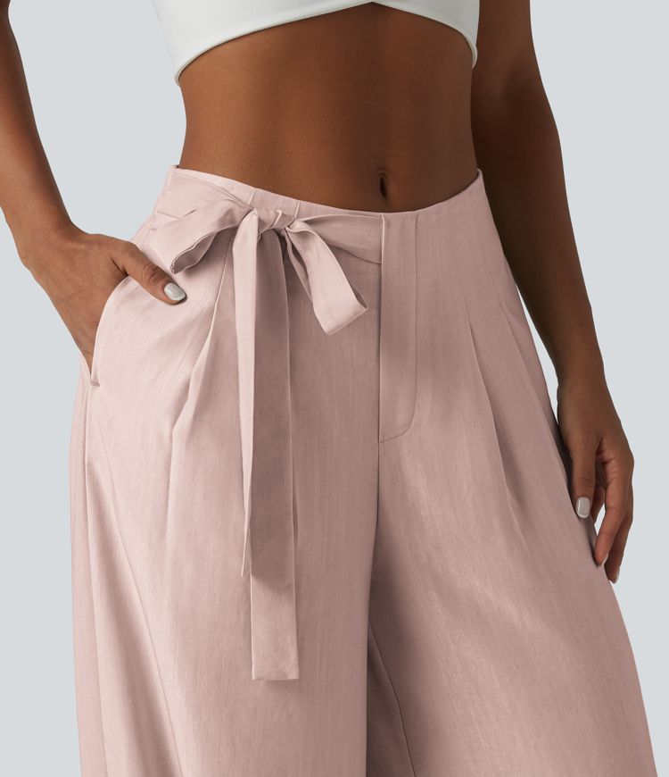 Pantalon large fluide taille haute en lin mélangé avec poches et liens latéraux Pantalon large fluide taille haute en lin mélangé avec poches et liens latéraux