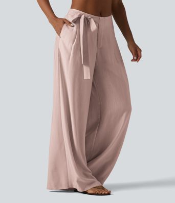 Pantalon large fluide taille haute en lin mélangé avec poches et liens latéraux Pantalon large fluide taille haute en lin mélangé avec poches et liens latéraux