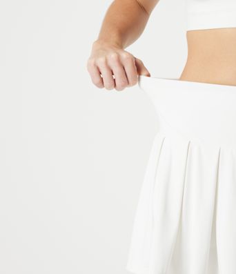SoftlyZero™ QuickDry Mid Rise Tummy Control Pleated 2-in-1 Mini Tennis Skirt with Pockets