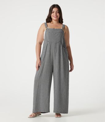 Lässige Latzhose in Leinenoptik mit mehreren Taschen und Karomuster - Plus-Size