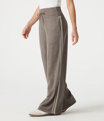 Lässige, gerippte Baggy-Hose mit hohem Bund, Seitentaschen, Bauchkontrolle, Kordelzug und seitlichen Streifen