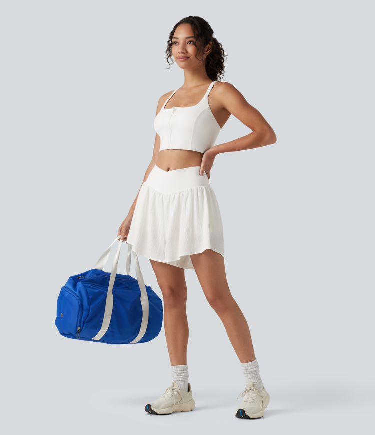Crossover 2-in-1 Crinkle-Laufshorts mit hohem Bund, seitlichem Saumschlitz und Taschen