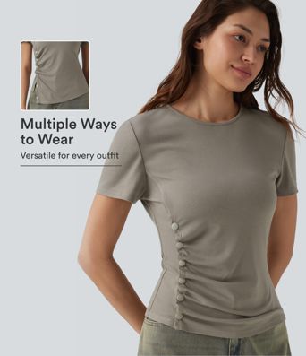 Camiseta casual con cuello redondo, manga corta y botones a presión Camiseta casual con cuello redondo, manga corta y botones a presión