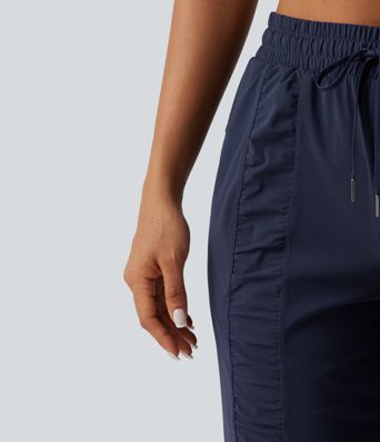 Hochgeschnittene, geraffte Jogginghose mit Kordelzug, schmal zulaufendem Bein, schnelltrocknend und atmungsaktiv, mit Taschen – UPF 40+