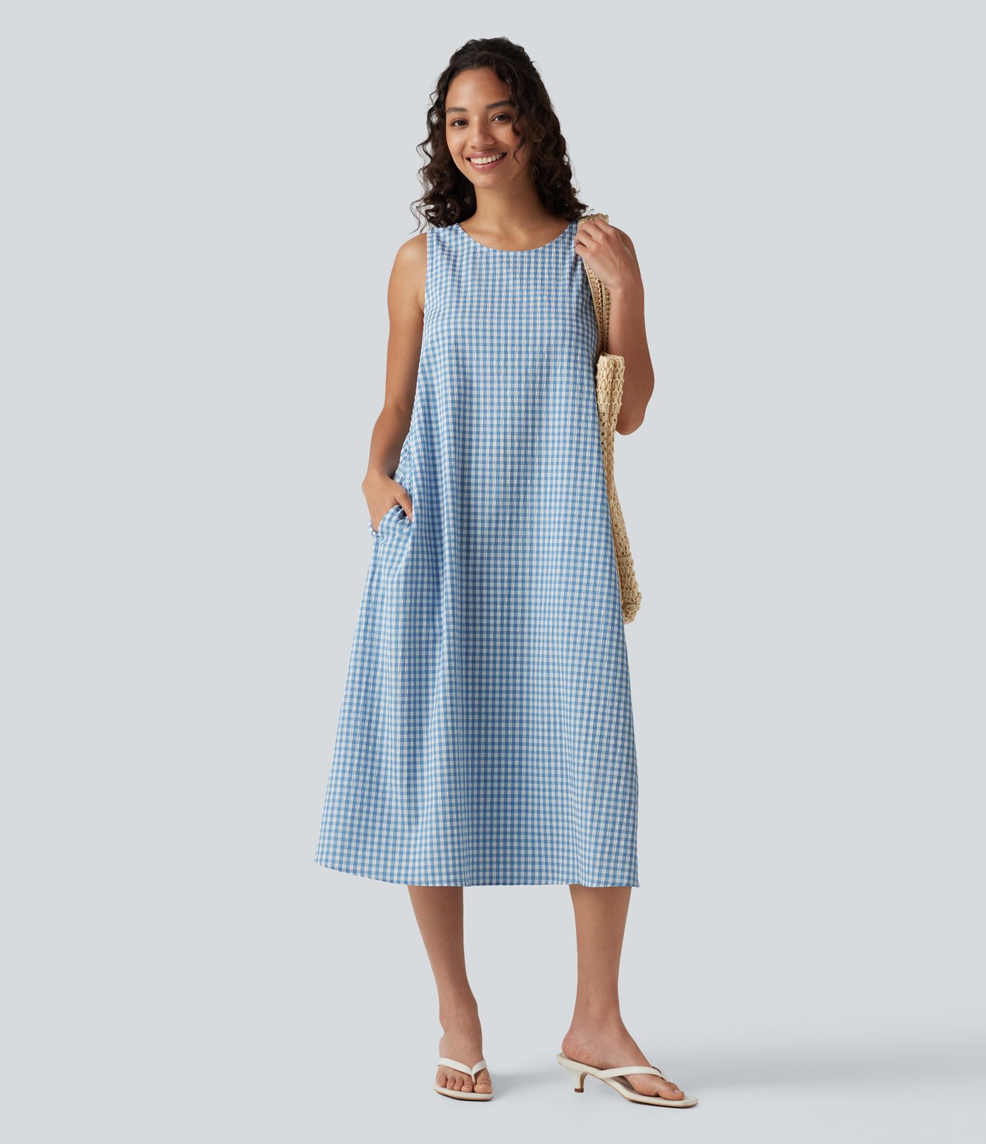 Lässiges, ärmelloses Midikleid mit Rundhalsausschnitt, Seitentaschen und Karomuster - kürzere Version