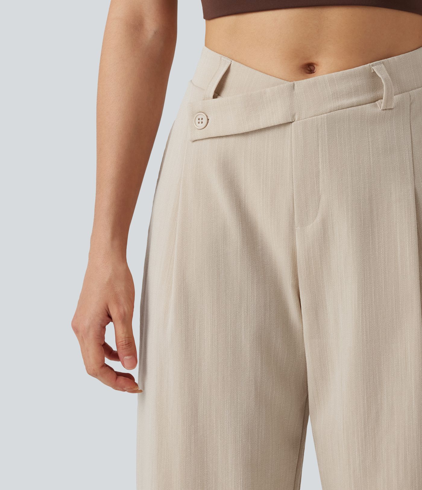Pantalones de trabajo asimétricos de talle medio con pernera tipo barril, tacto de lino y bolsillos