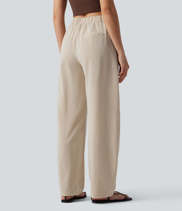 Pantalones de trabajo asimétricos de talle medio con pernera tipo barril, tacto de lino y bolsillos