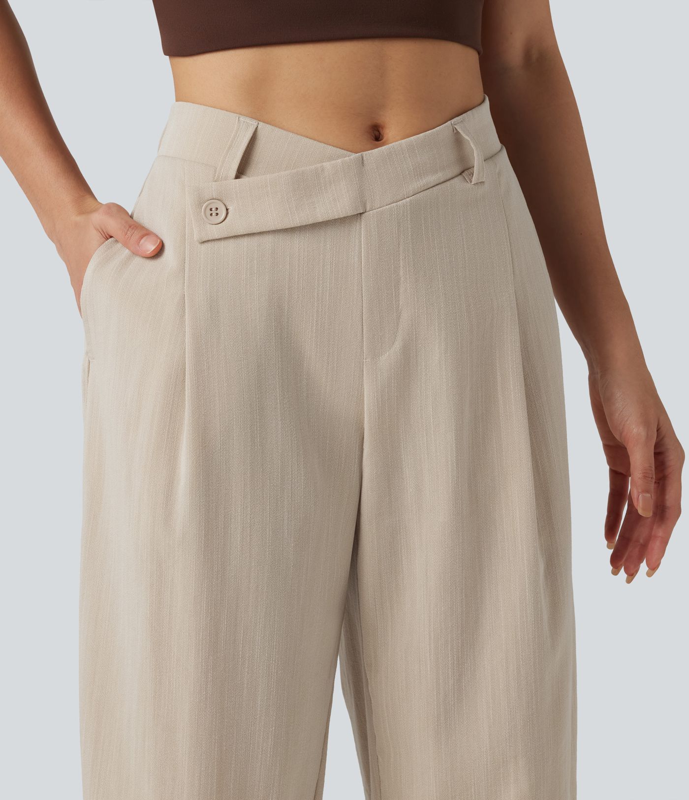 Pantalones de trabajo asimétricos de talle medio con pernera tipo barril, tacto de lino y bolsillos