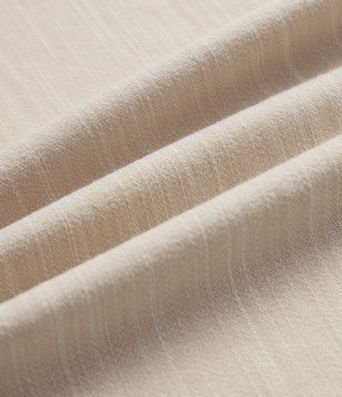 Pantalones de trabajo asimétricos de talle medio con pernera tipo barril, tacto de lino y bolsillos
