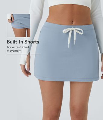 Jupe mini décontractée en coton 2-en-1, taille mi-haute, cordon de serrage, fermeture éclair latérale et poche