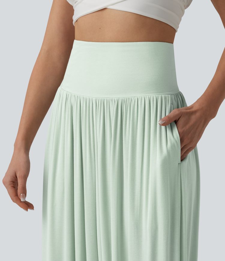 Joggers acanalados de cintura súper alta con bolsillos. Joggers acanalados de cintura súper alta con bolsillos.