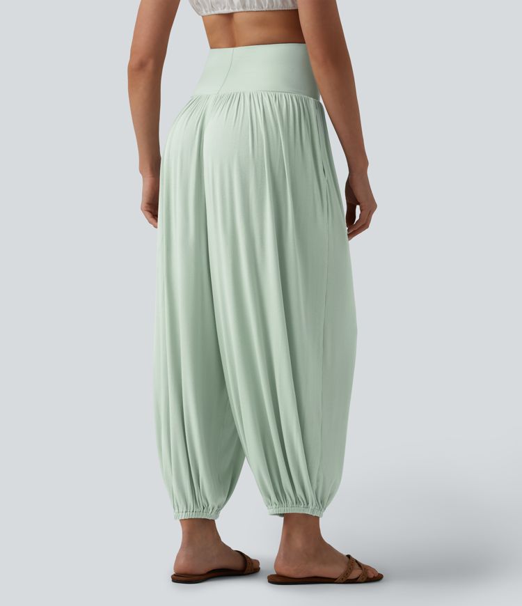 Joggers acanalados de cintura súper alta con bolsillos. Joggers acanalados de cintura súper alta con bolsillos.