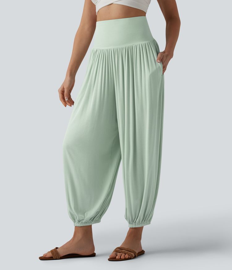 Joggers acanalados de cintura súper alta con bolsillos. Joggers acanalados de cintura súper alta con bolsillos.