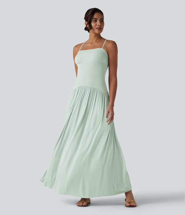 Vestido slip maxi acanalado y fluido con bolsillos