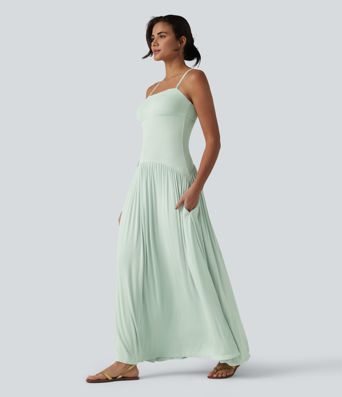 Vestido slip maxi acanalado y fluido con bolsillos
