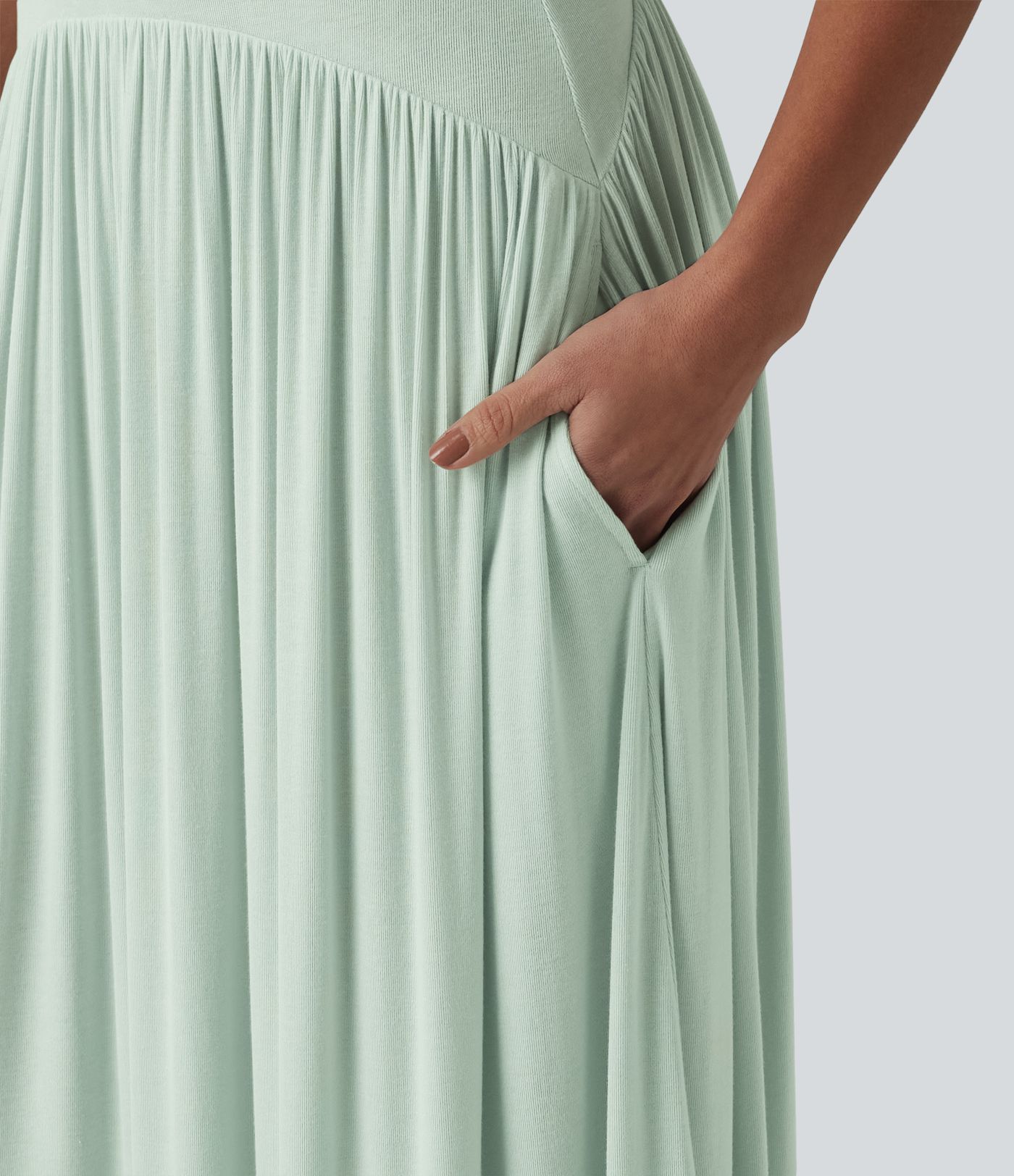 Vestido slip maxi acanalado y fluido con bolsillos
