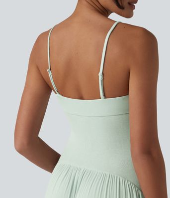 Vestido slip maxi acanalado y fluido con bolsillos