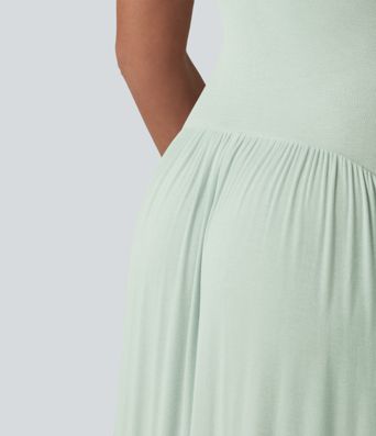 Vestido slip maxi acanalado y fluido con bolsillos