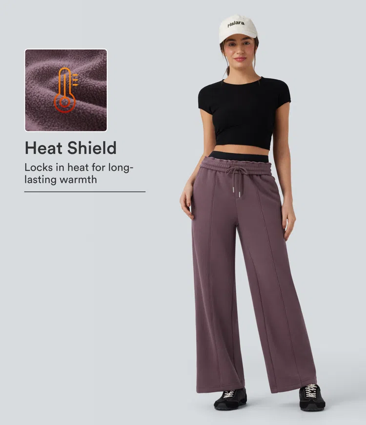 Flint Pantalones de algodón de talle alto, de corte relajado, en material tipo forro polar, perneras rectas, con cordón y bolsillos. / 1