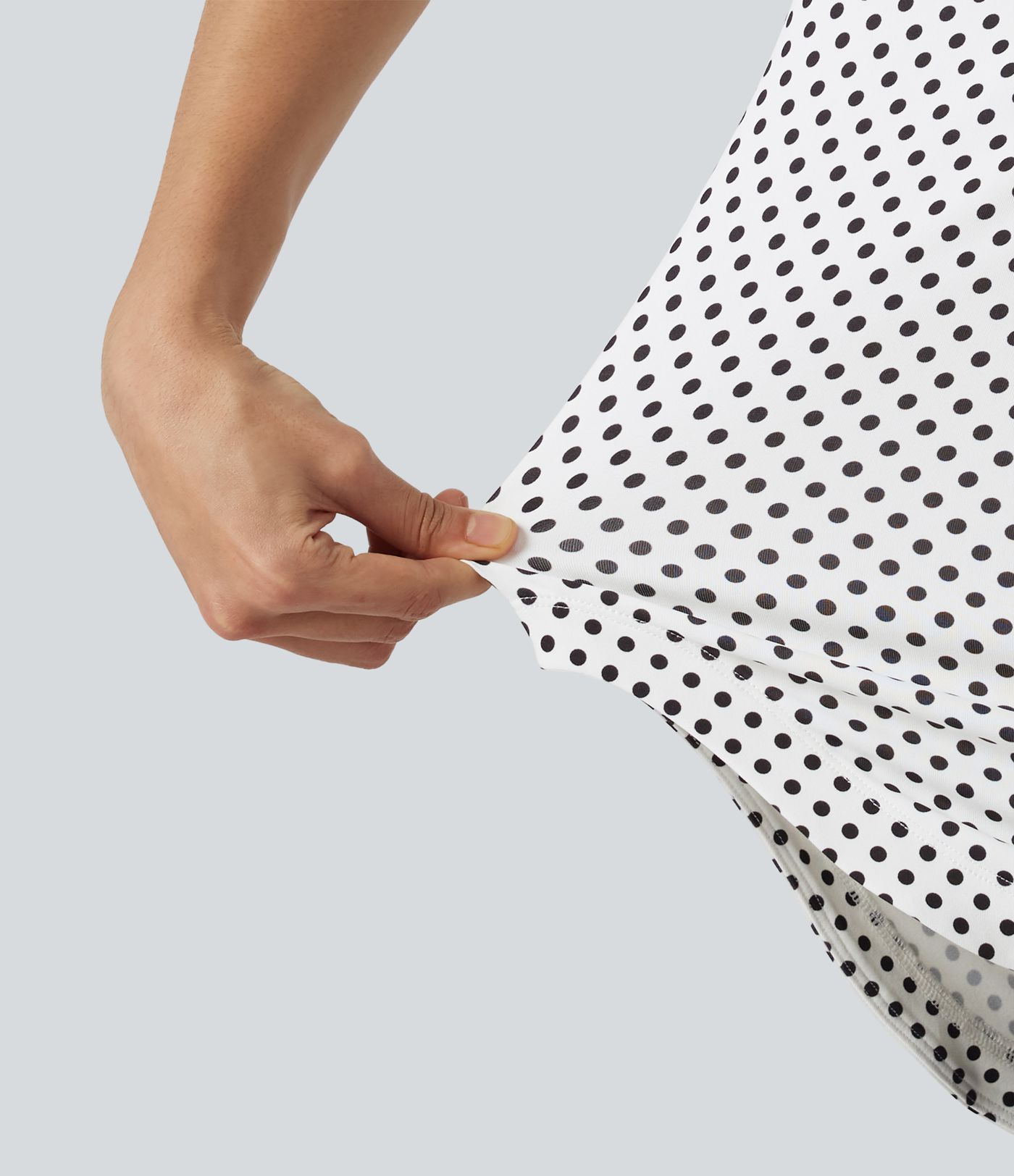 Top casual à pois épaule dénudée à manches courtes avec ourlet incurvé asymétrique et brassière intégrée