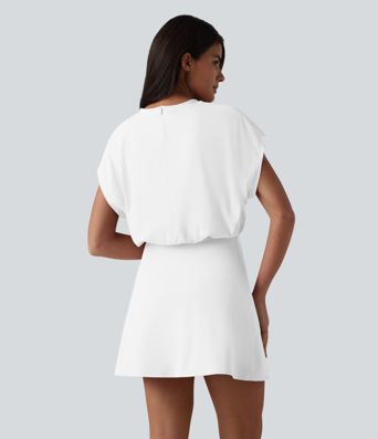 Robe de sport mini de yoga SoftlyZero™ Airy 2-en-1 effet frais InstantCool col rond à manches courtes, demi-zip et poches, accès facile Easy Peasy
