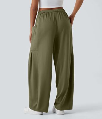 Pantalon Large Fluide Taille Mi-Haute Taille Élastique Cordon Poches Latérales Ourlet Flottant Pantalon Large Fluide Taille Mi-Haute Taille Élastique Cordon Poches Latérales Ourlet Flottant