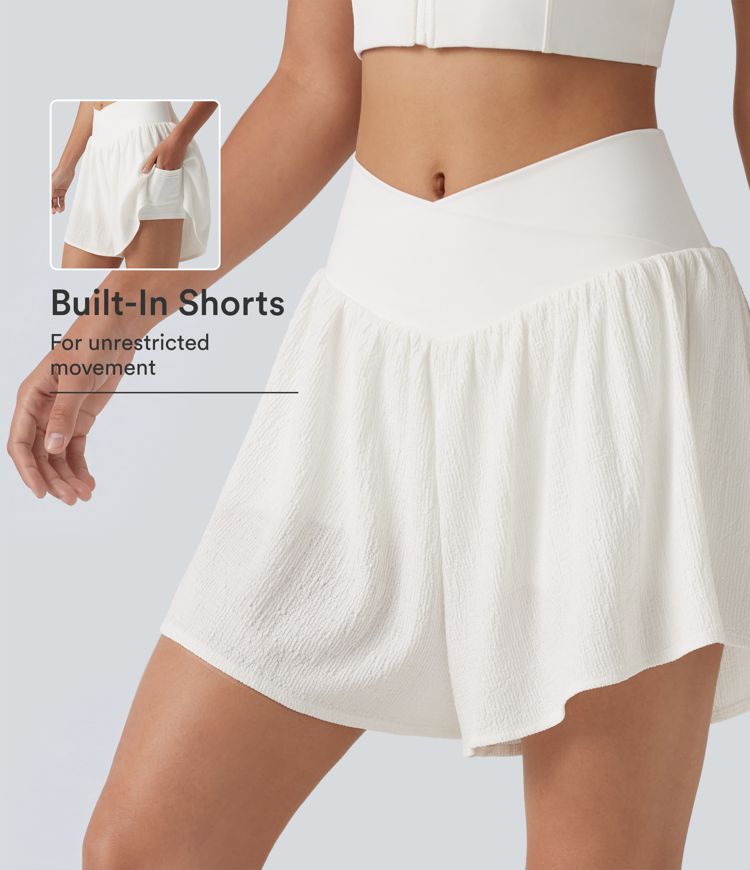 Short de running 2-en-1 taille haute croisée en tissu froissé avec ourlet fendu et poches Short de running 2-en-1 taille haute croisée en tissu froissé avec ourlet fendu et poches