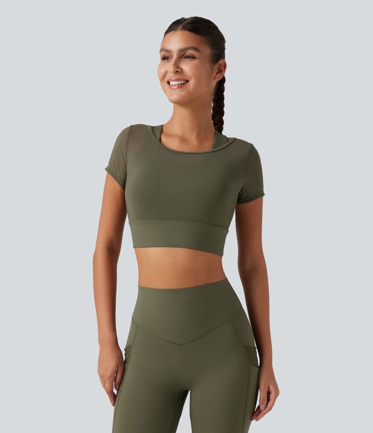 Crop top de running effet frais InstantCool à séchage rapide avec encolure bateau, mesh contrasté, manches courtes, coussinets amovibles et protection solaire UPF50+ Crop top de running effet frais InstantCool à séchage rapide avec encolure bateau, mesh contrasté, manches courtes, coussinets amovibles et protection solaire UPF50+